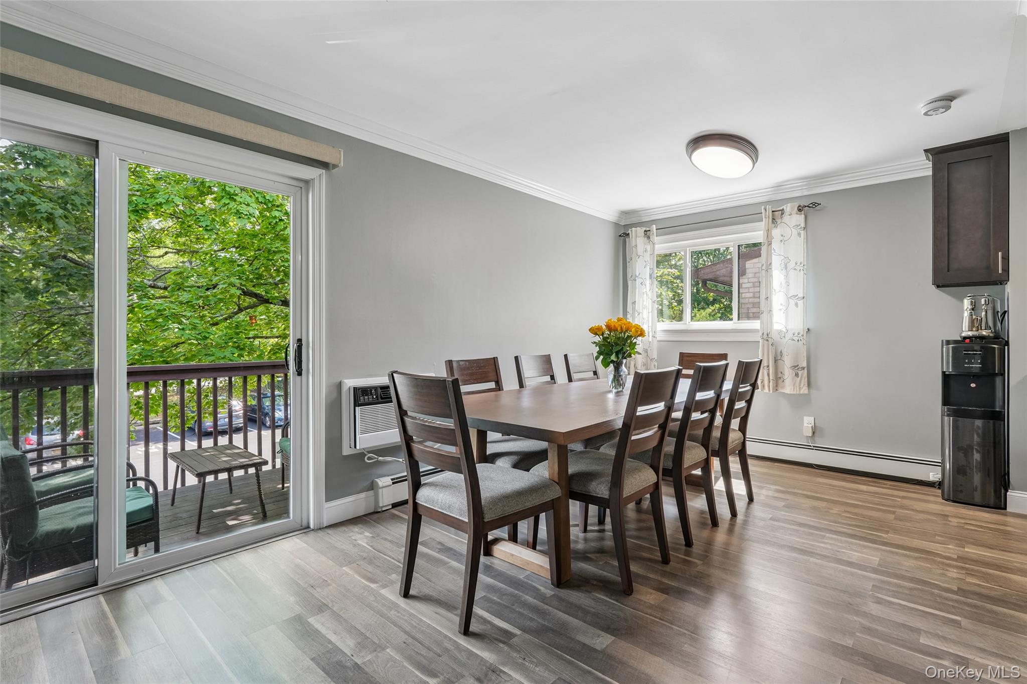 2 Secora Road, Unit C5 Monsey, NY 10952 - Photo 12 of 32 Wood-finish flooring, crown molding, and light gray wall color