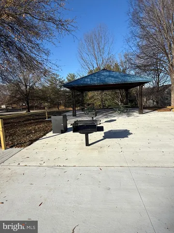 a view of a field with an trees