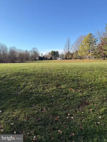 a picture of a bench in a white building
