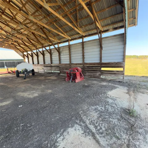 a view of yard with car parked