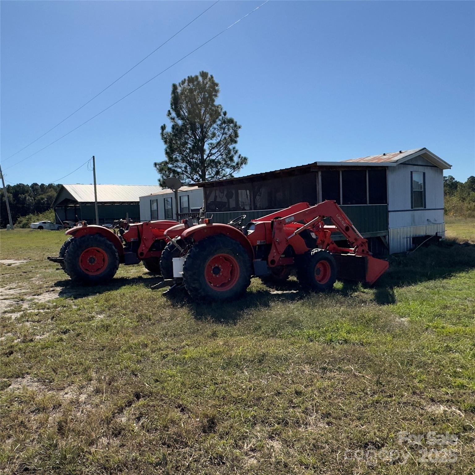 17808 Hamlet Road Laurel Hill, NC 28351 - Photo 25 of 40 a car parked in front of a house