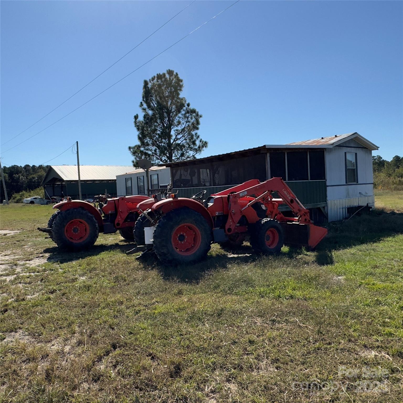17808 Hamlet Road Laurel Hill, NC 28351 - Photo 27 of 40 a view of a yard with a car parked in it