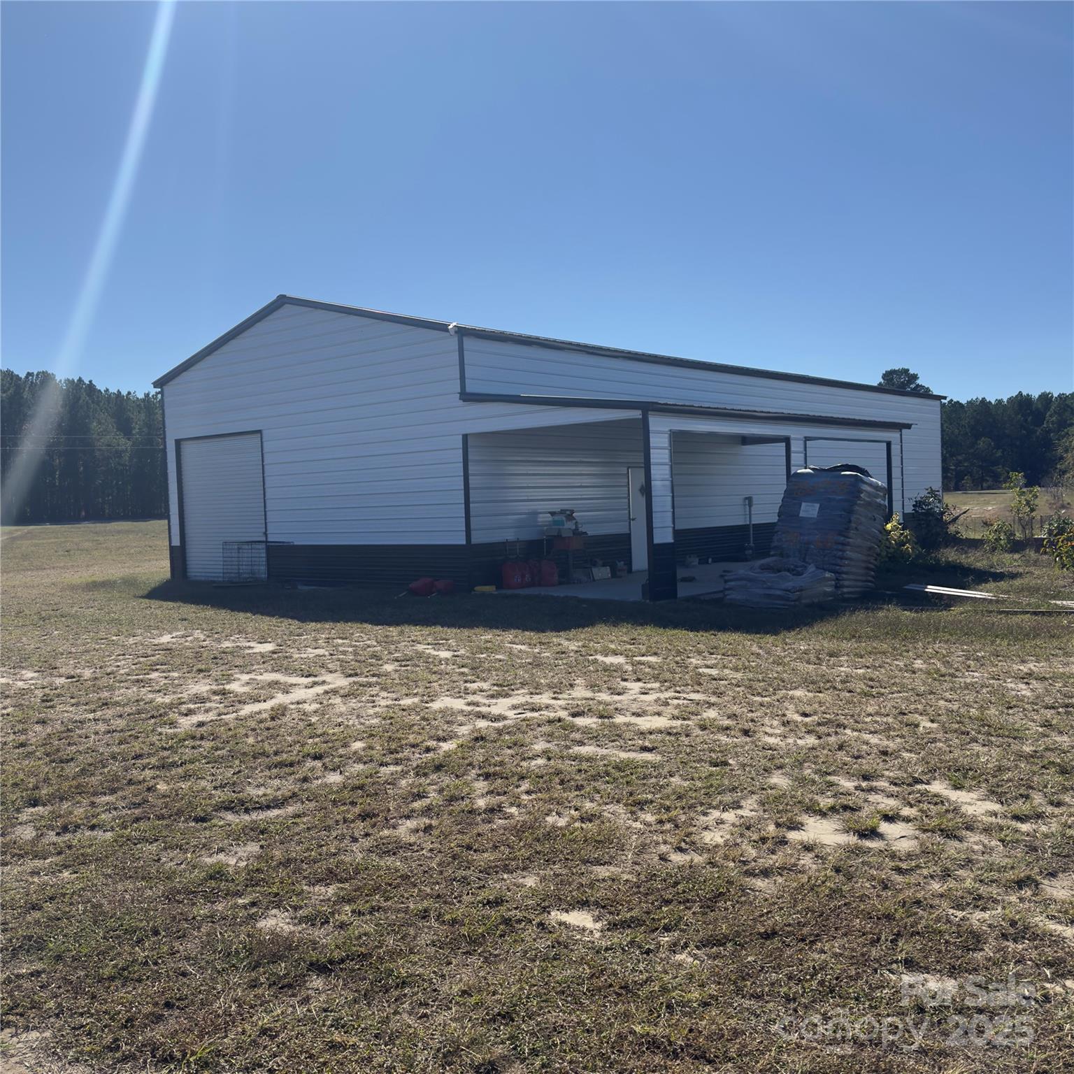 17808 Hamlet Road Laurel Hill, NC 28351 - Photo 39 of 40 a view of a house with a yard