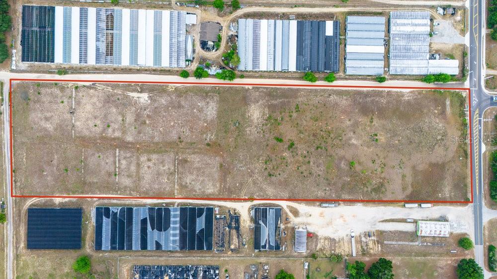 2045 West Kelly Park Road Apopka, FL 32712 - Photo 7 of 16 a view of balcony with wooden floor