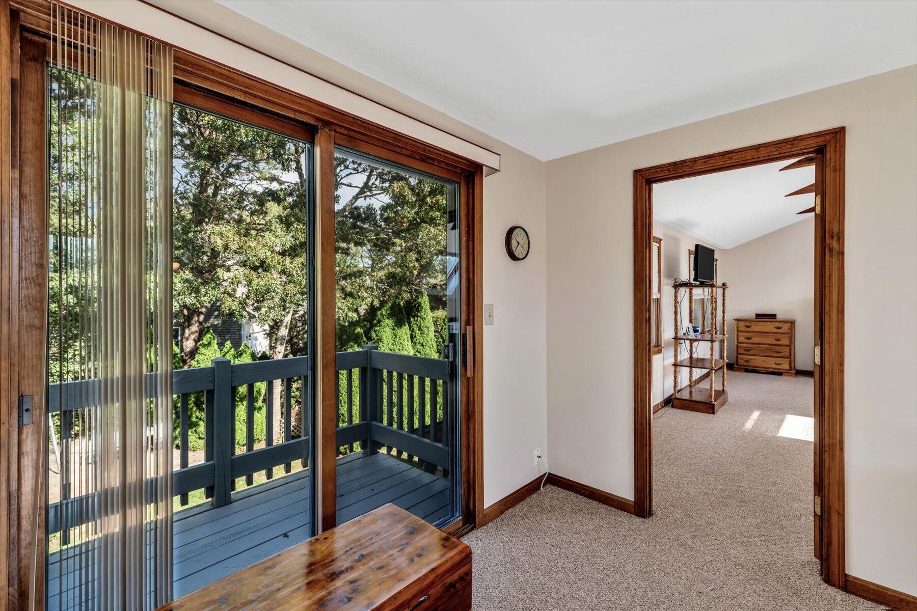 4 Surf Drive Mashpee, MA 02649 - Photo 11 of 22 a view of a living room and a balcony