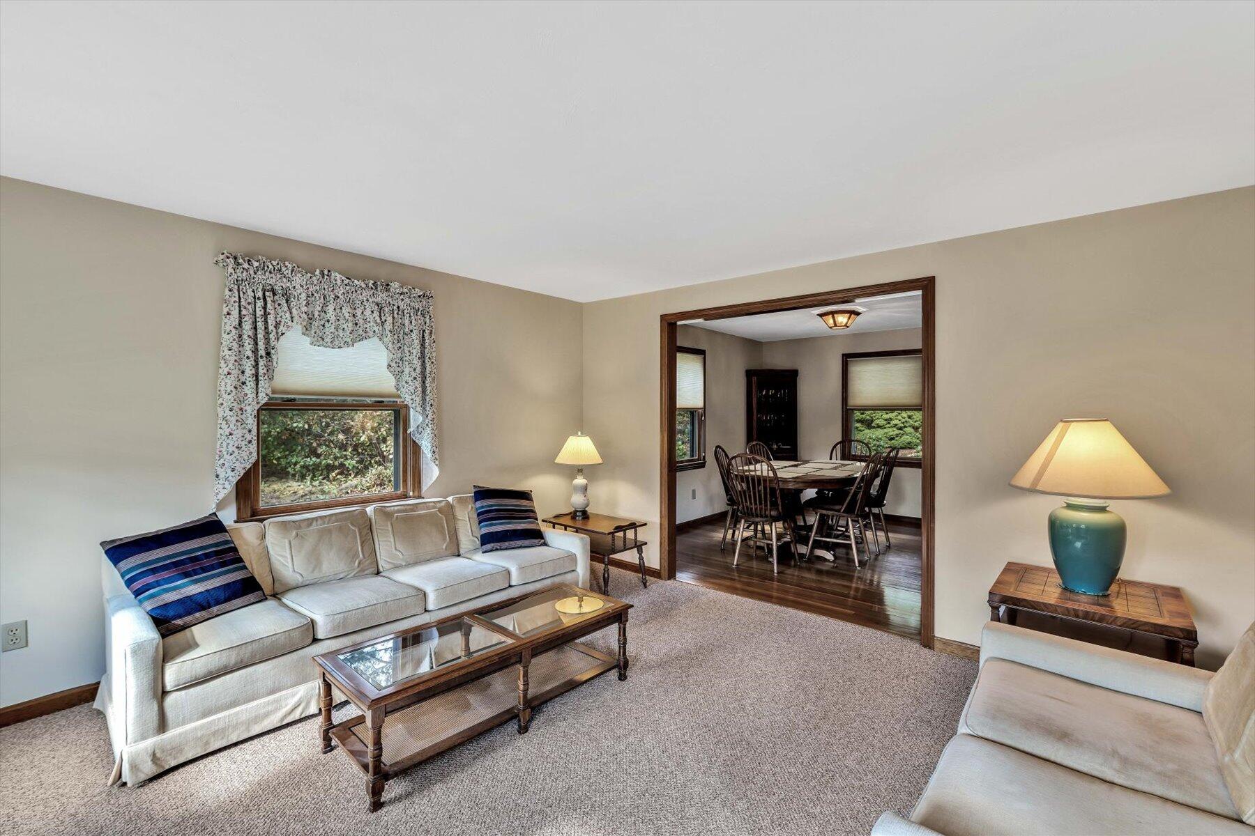 4 Surf Drive Mashpee, MA 02649 - Photo 3 of 22 a living room with furniture and a table