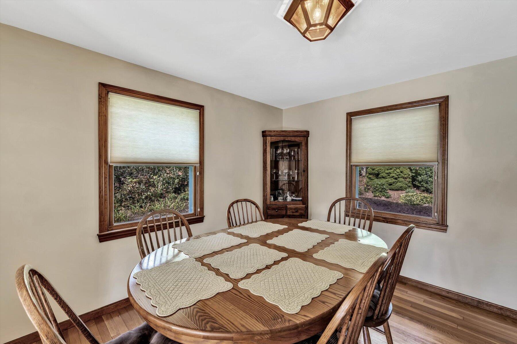 4 Surf Drive Mashpee, MA 02649 - Photo 6 of 22 a view of a dining room with furniture window and wooden floor