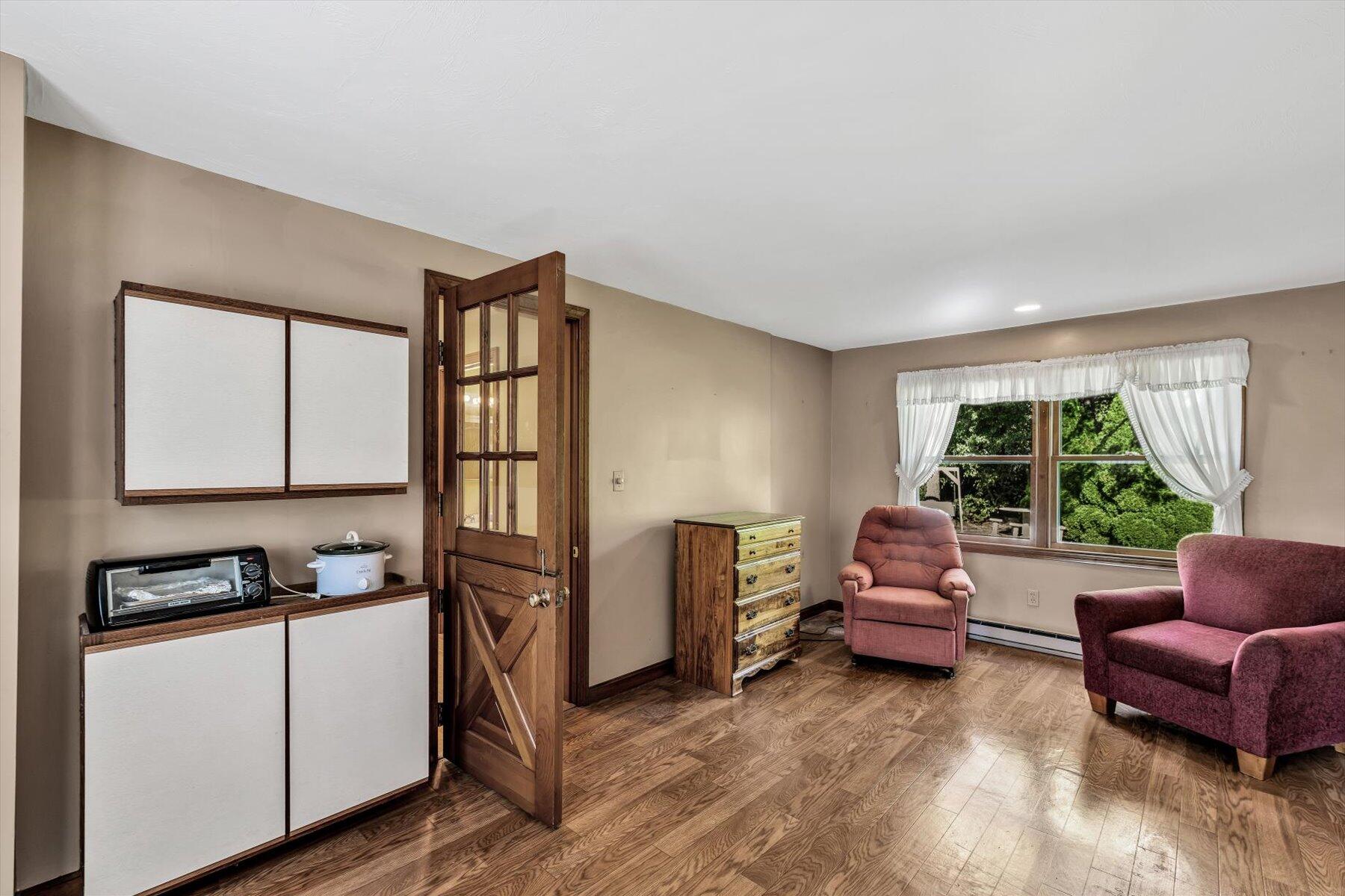4 Surf Drive Mashpee, MA 02649 - Photo 7 of 22 a living room with furniture and a window