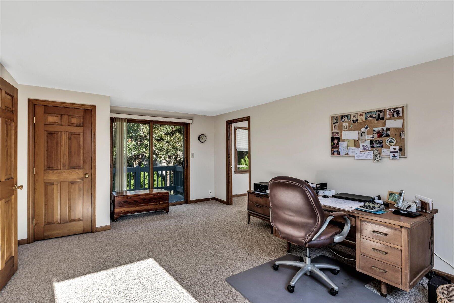 4 Surf Drive Mashpee, MA 02649 - Photo 10 of 22 a view of a workspace with furniture and a window
