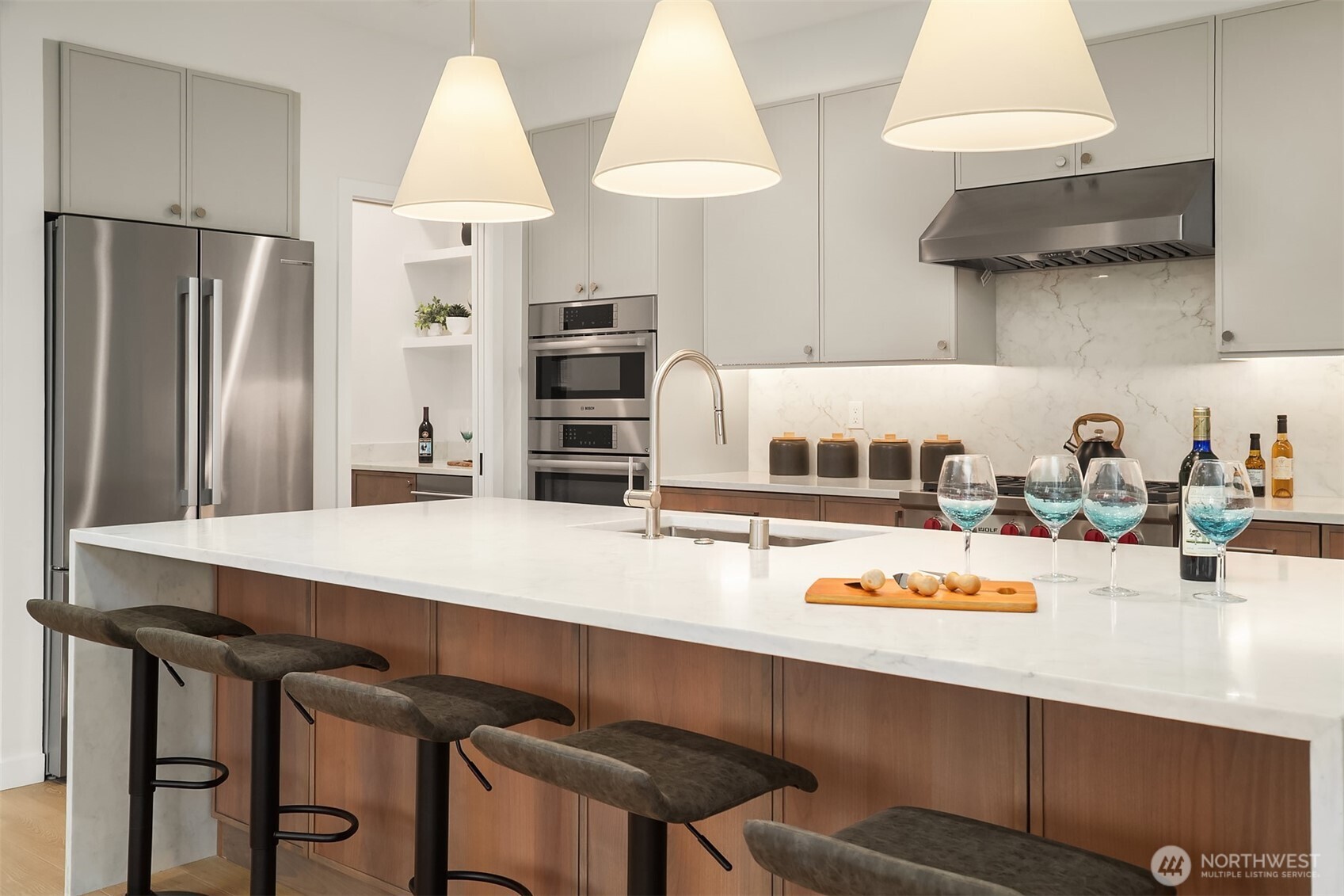 6214 40th Avenue Northeast Seattle, WA 98115 - Photo 14 of 40 a kitchen with a table and chairs in it