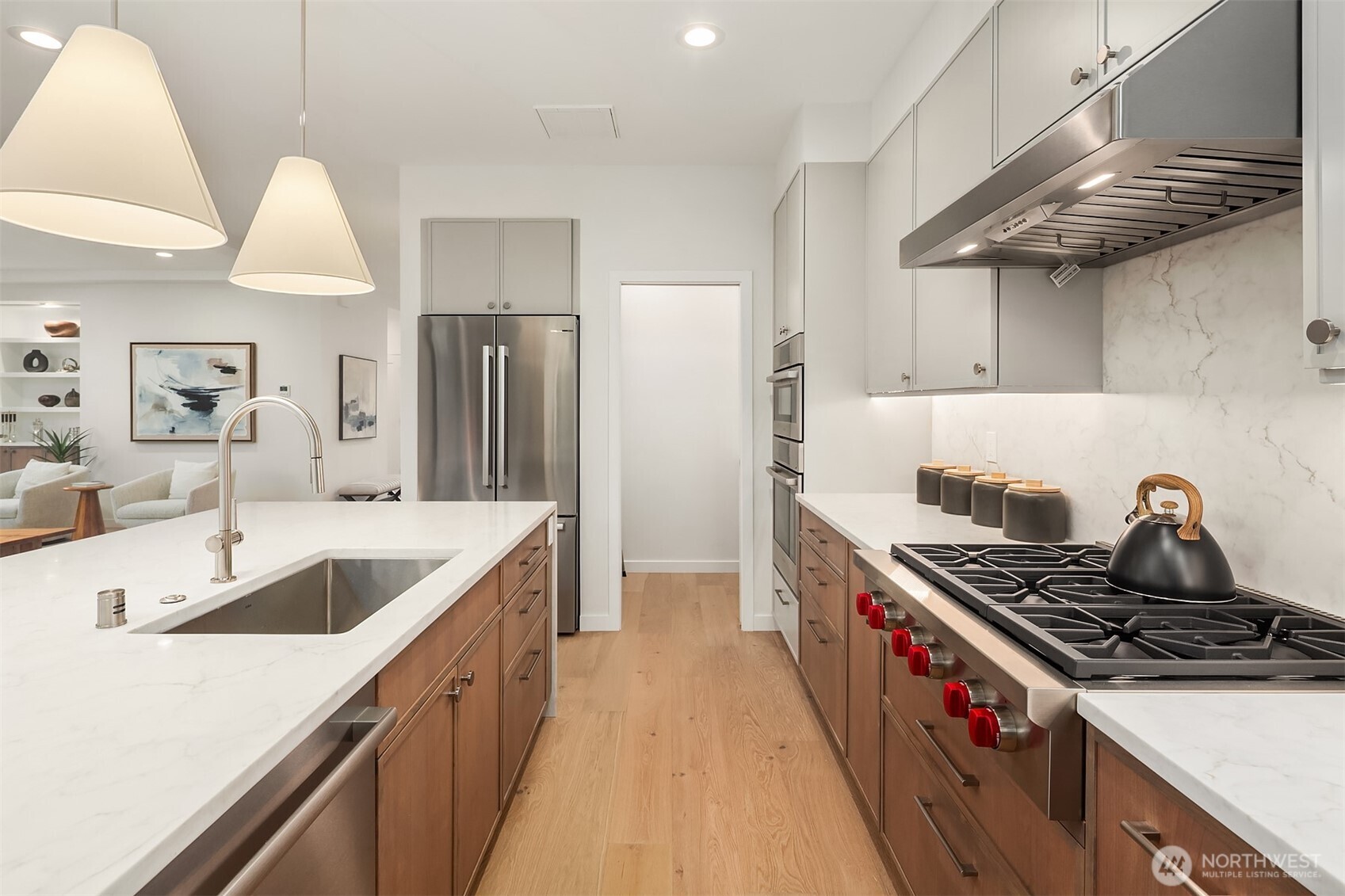 6214 40th Avenue Northeast Seattle, WA 98115 - Photo 15 of 40 a kitchen with granite countertop a stove and a sink