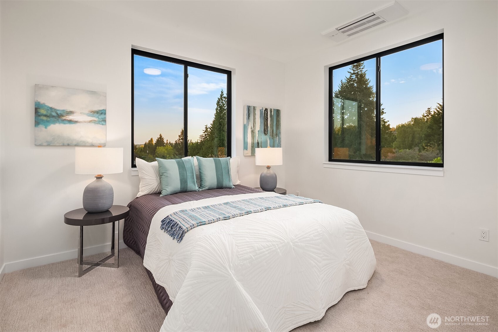 6214 40th Avenue Northeast Seattle, WA 98115 - Photo 19 of 40 a bedroom with a bed and a painting on the wall