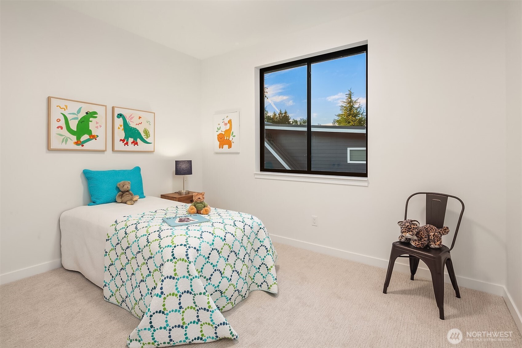 6214 40th Avenue Northeast Seattle, WA 98115 - Photo 21 of 40 a bedroom with a bed and a chair