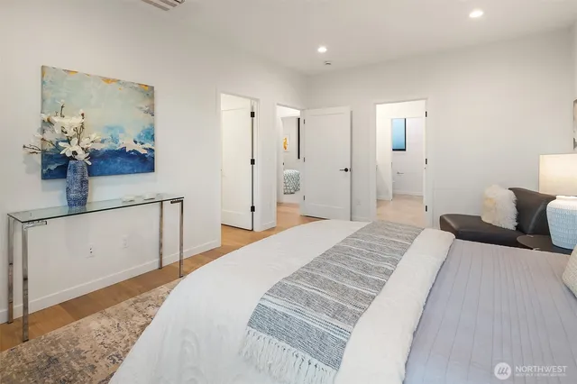 a spacious bathroom with a bathtub and a shower