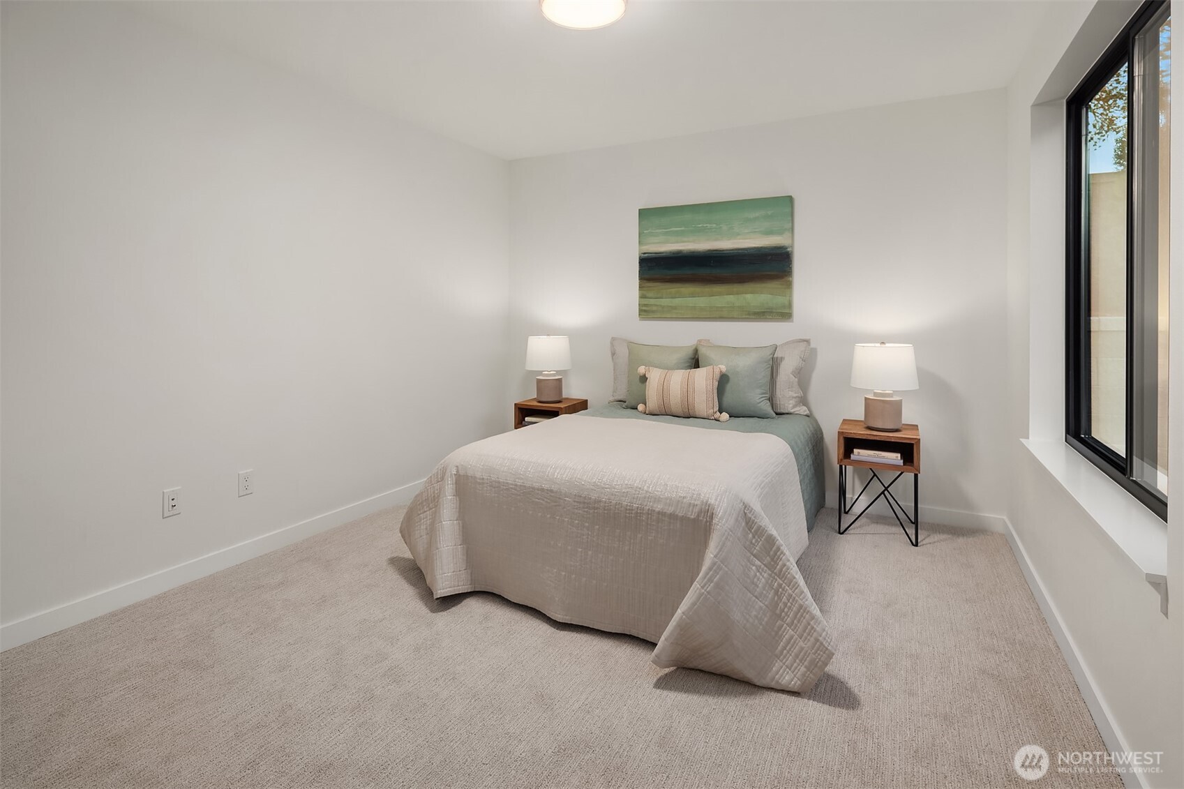 6214 40th Avenue Northeast Seattle, WA 98115 - Photo 33 of 40 a bedroom with a bed and a large window