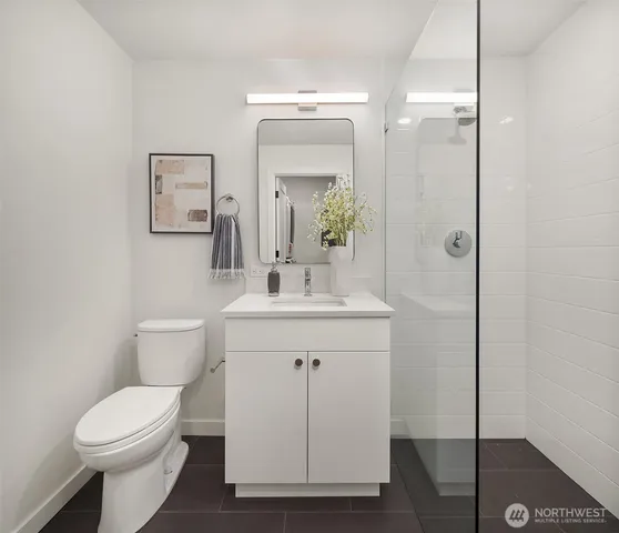 a view of a hallway with washer and dryer