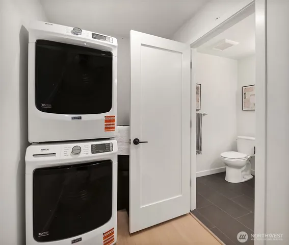 a view of backyard of house with green space