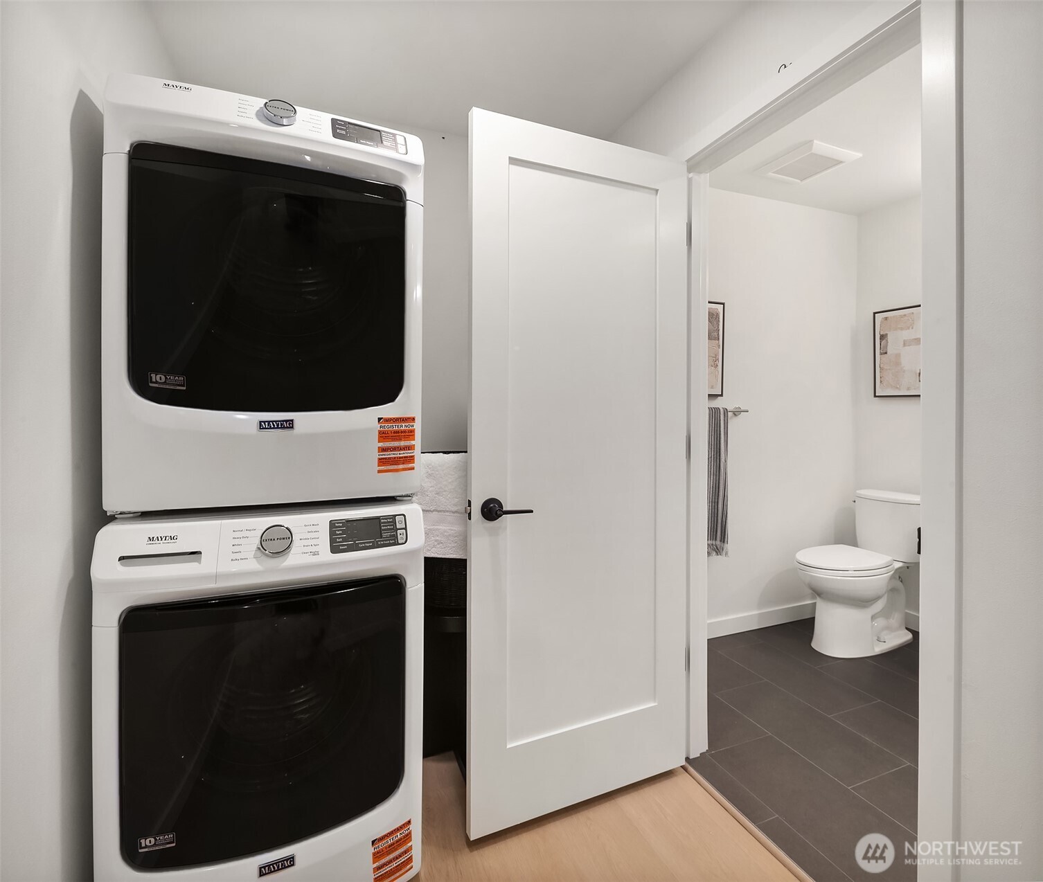 6214 40th Avenue Northeast Seattle, WA 98115 - Photo 35 of 40 a view of a hallway with washer and dryer
