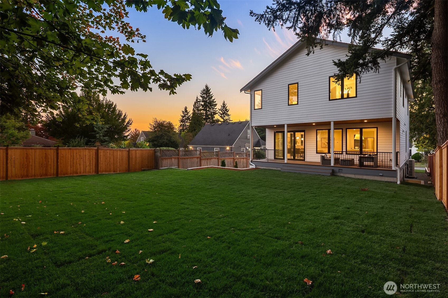 6214 40th Avenue Northeast Seattle, WA 98115 - Photo 36 of 40 a view of backyard of house with green space