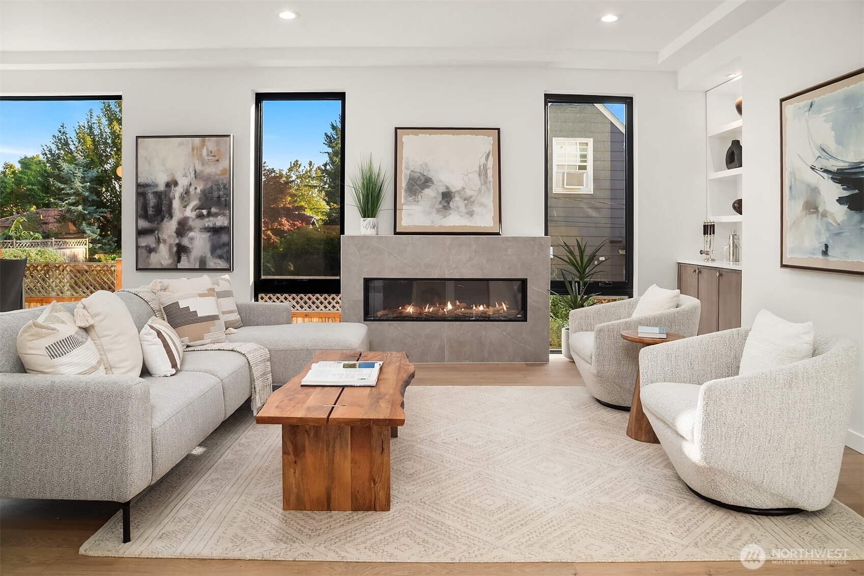 6214 40th Avenue Northeast Seattle, WA 98115 - Photo 5 of 40 a living room with furniture and a fireplace