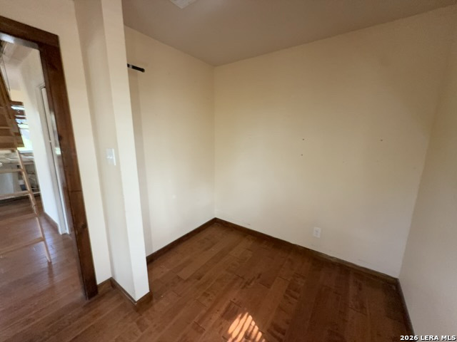 15005 Broken Bow Trail Austin, TX 78734 - Photo 11 of 13 a view of empty room with wooden floor