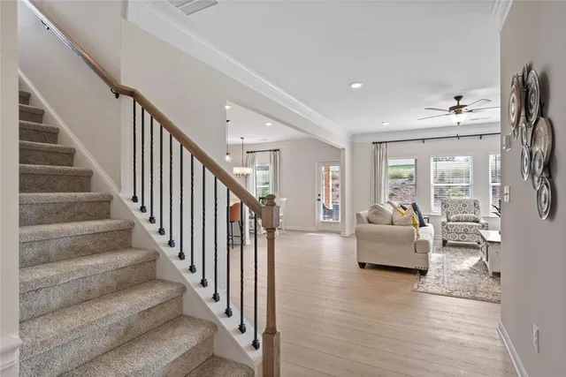 a living room with fireplace furniture and a flat screen tv