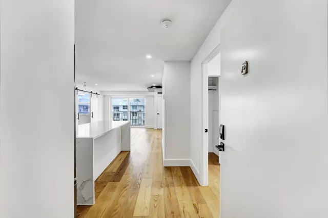 a bathroom with a tub and shower