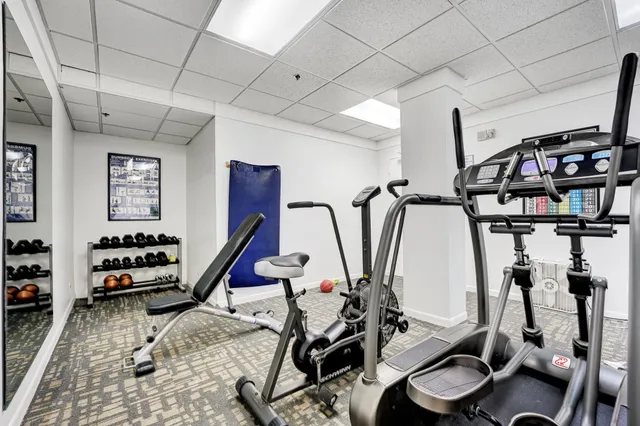 a view of a room with gym equipment