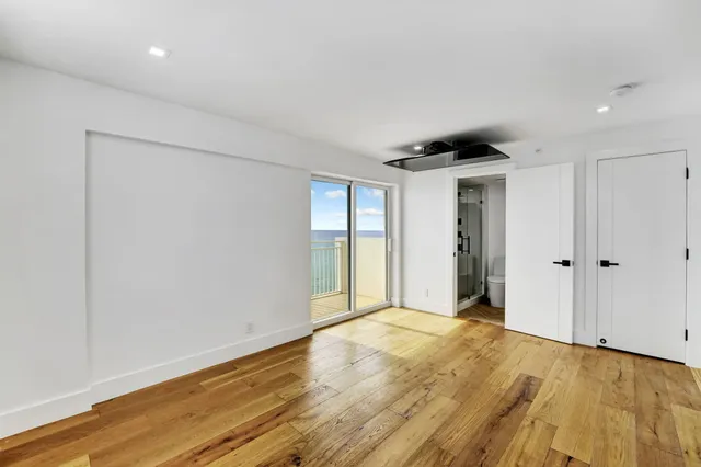 a view of an empty room and window