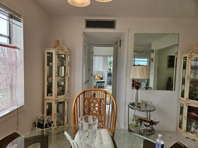 a view of living room and dining room