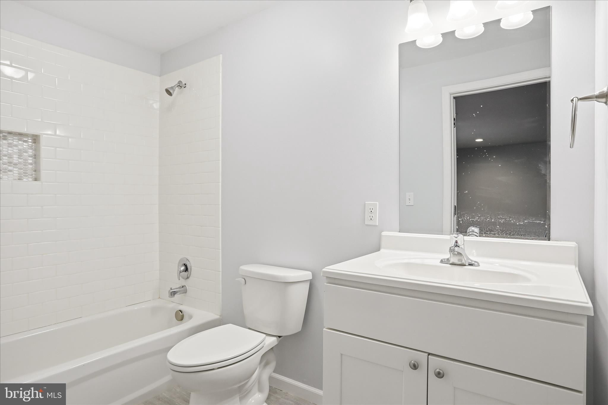 1033 Mountain Heights Road Front Royal, VA 22630 - Photo 27 of 44 a bathroom with a sink toilet and shower