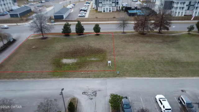 a view of swimming pool with outdoor seating