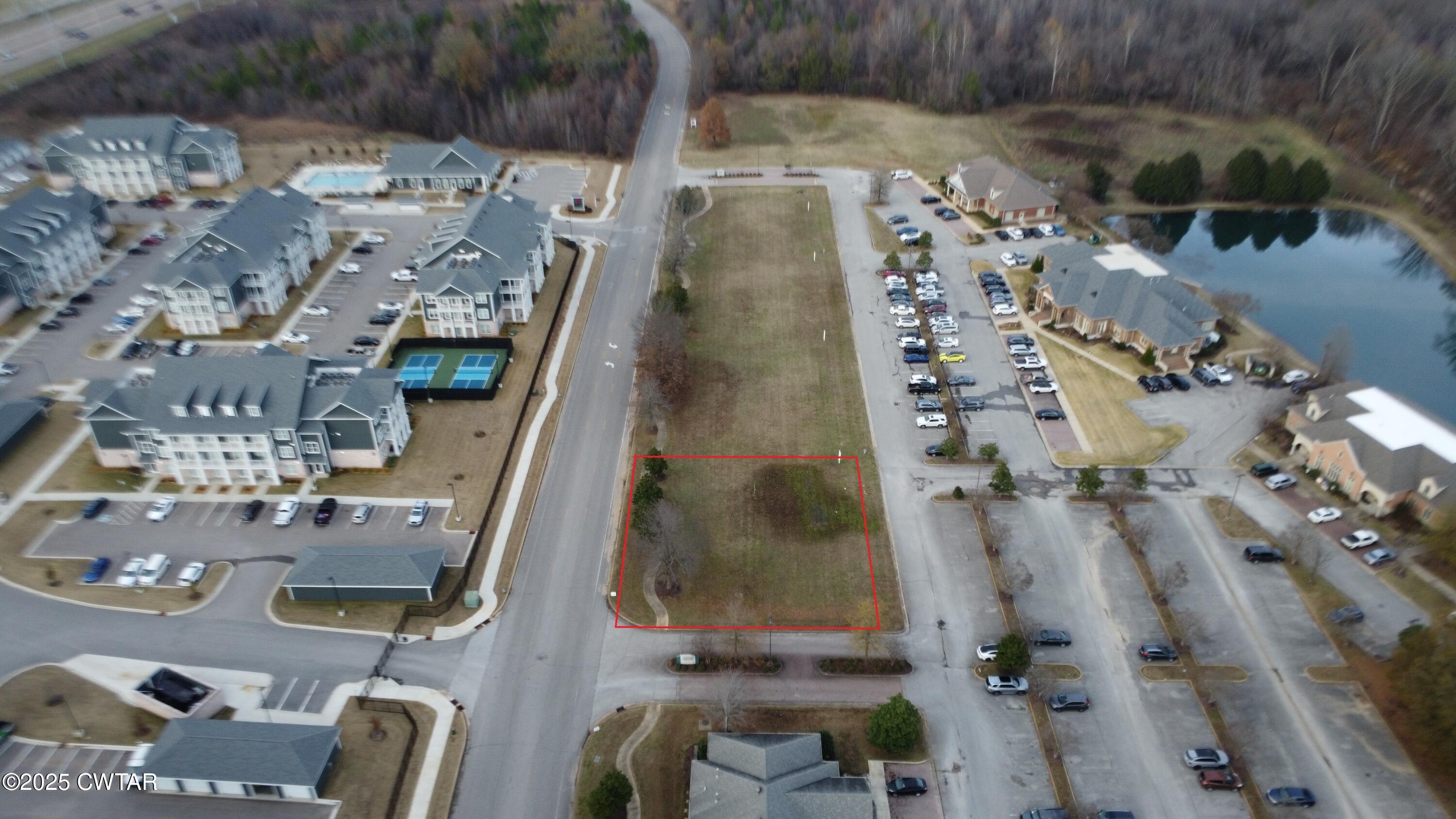 178 Murray Guard Drive Jackson, TN 38305 - Photo 3 of 6 an aerial view of residential houses with outdoor space