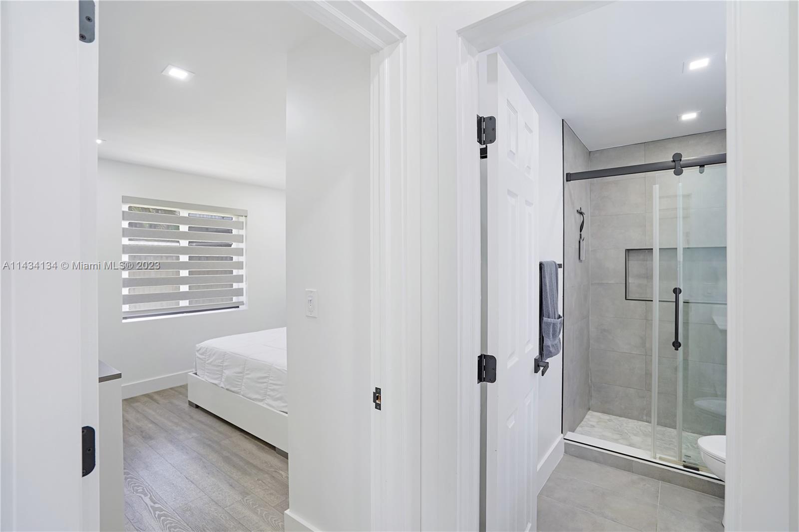 690 Southeast 3rd Place Hialeah, FL 33010 - Photo 26 of 31 a en suite bathroom with a shower