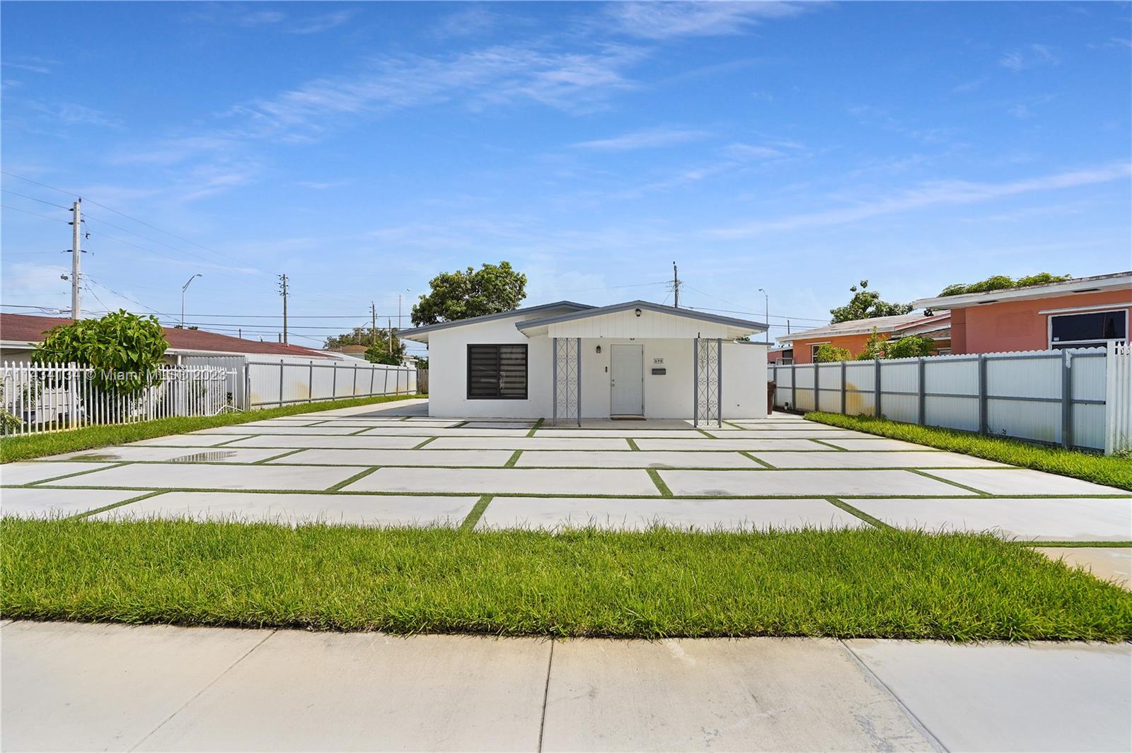 690 Southeast 3rd Place Hialeah, FL 33010 - Photo 10 of 31 a house view with a outdoor space
