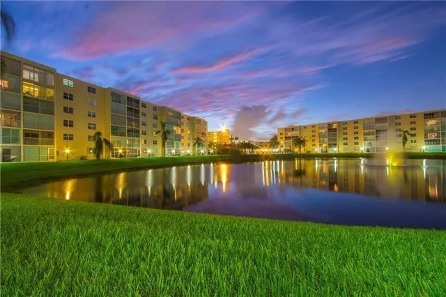 a view of a lake with a big yard