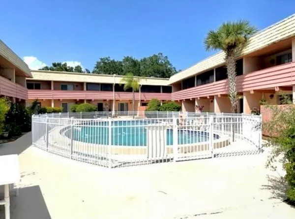 a view of a house with a swimming pool