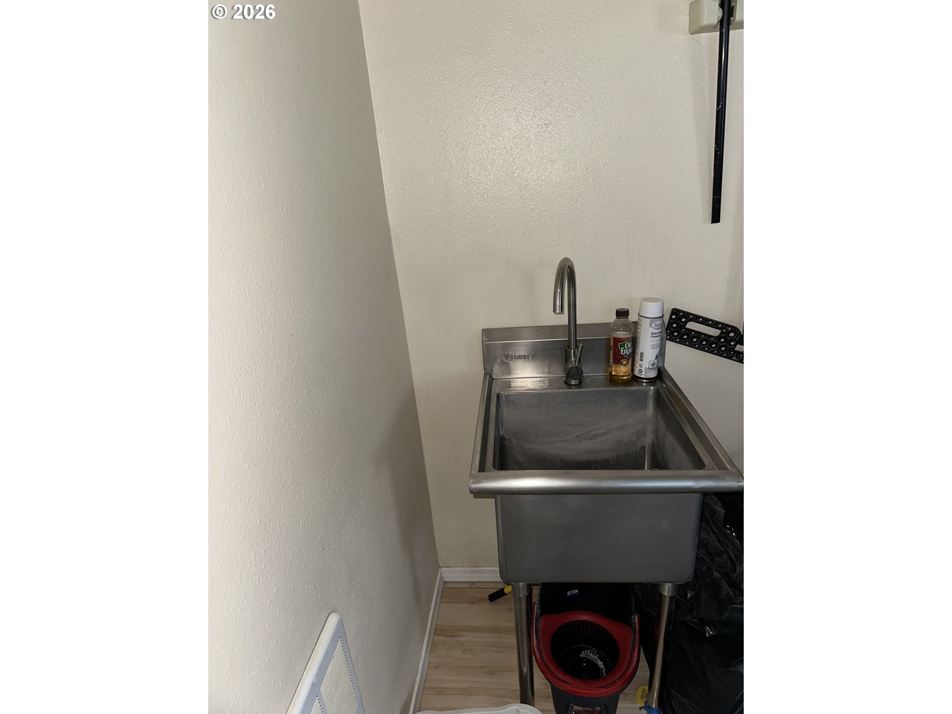 535 Emert Road Ione, OR 97843 - Photo 18 of 24 a kitchen with a sink and stainless steel appliances