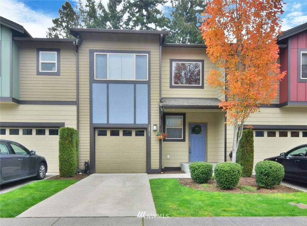16517 2nd Park Southeast Bothell, WA 98012 - Photo 1 of 22 a front view of a house with a yard and garage