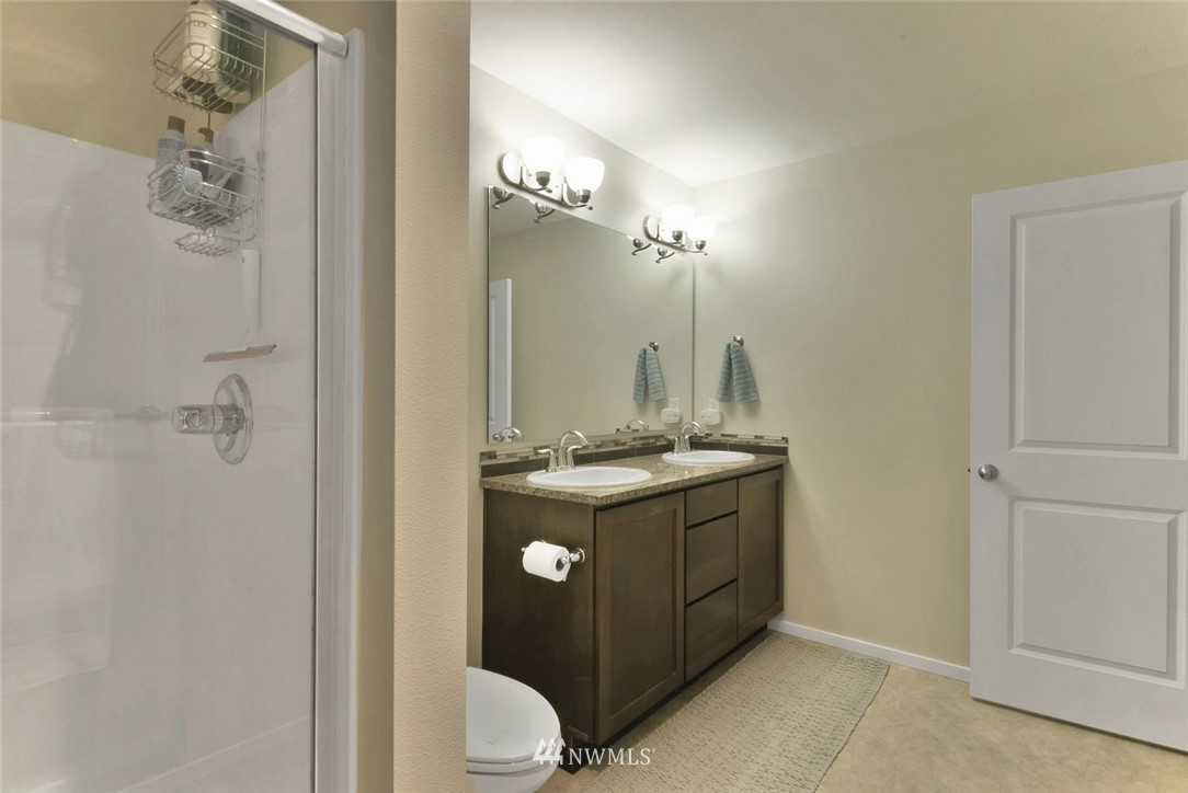 16517 2nd Park Southeast Bothell, WA 98012 - Photo 12 of 22 a view of bathroom with a sink and mirror