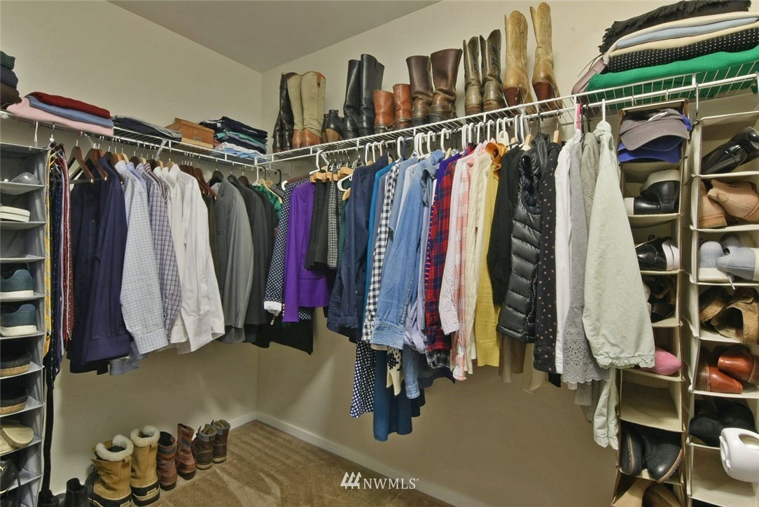 16517 2nd Park Southeast Bothell, WA 98012 - Photo 13 of 22 a view of walk in closet with clothes
