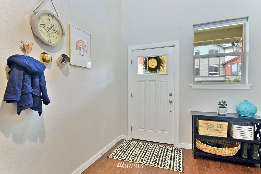 16517 2nd Park Southeast Bothell, WA 98012 - Photo 3 of 22 a view of room with furniture and wooden floor