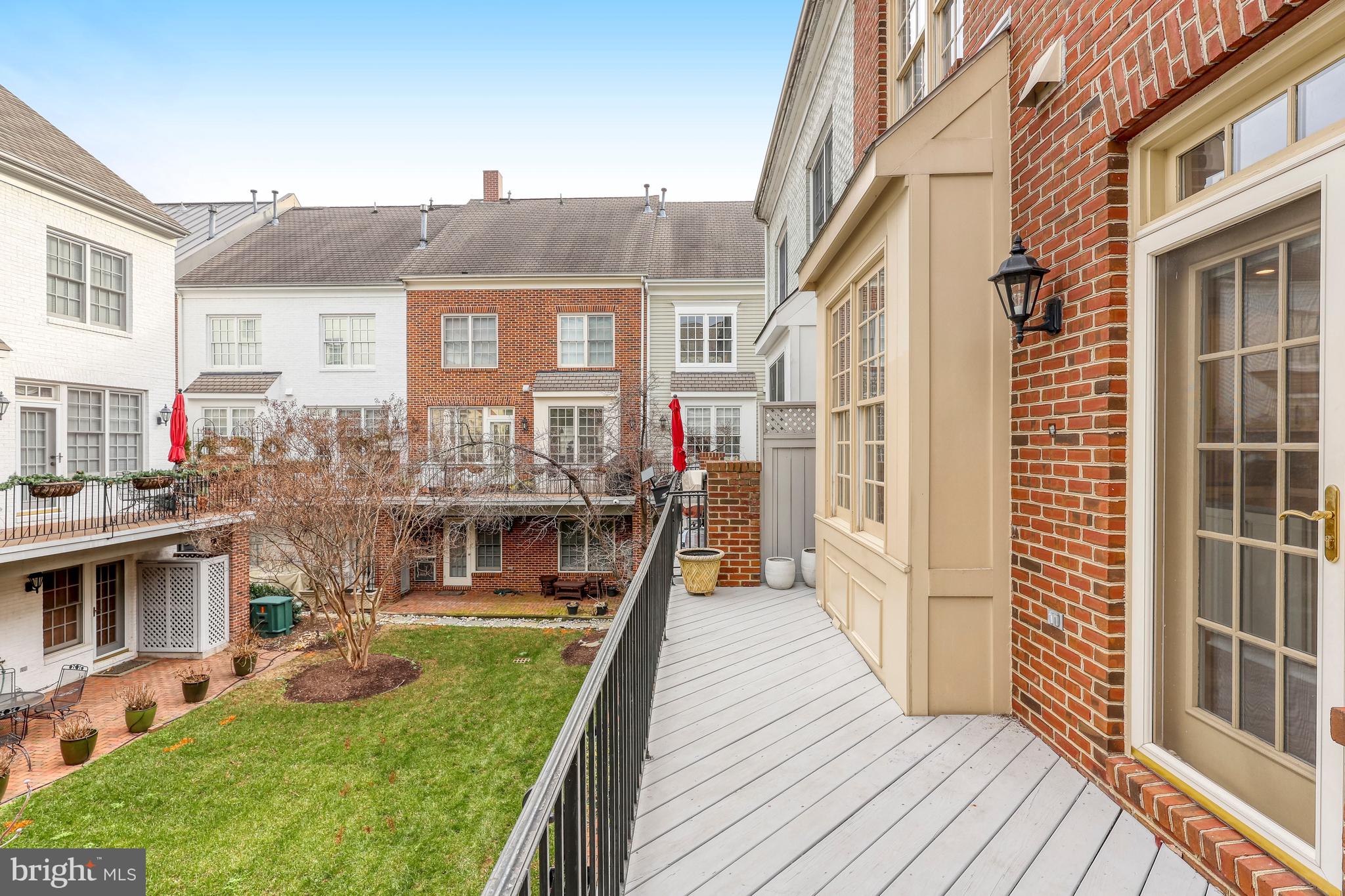 17 Alexander Street Alexandria, VA 22314 - Photo 16 of 30 a view of a house with roof deck and sitting area