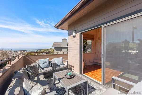 a view of roof deck with couch