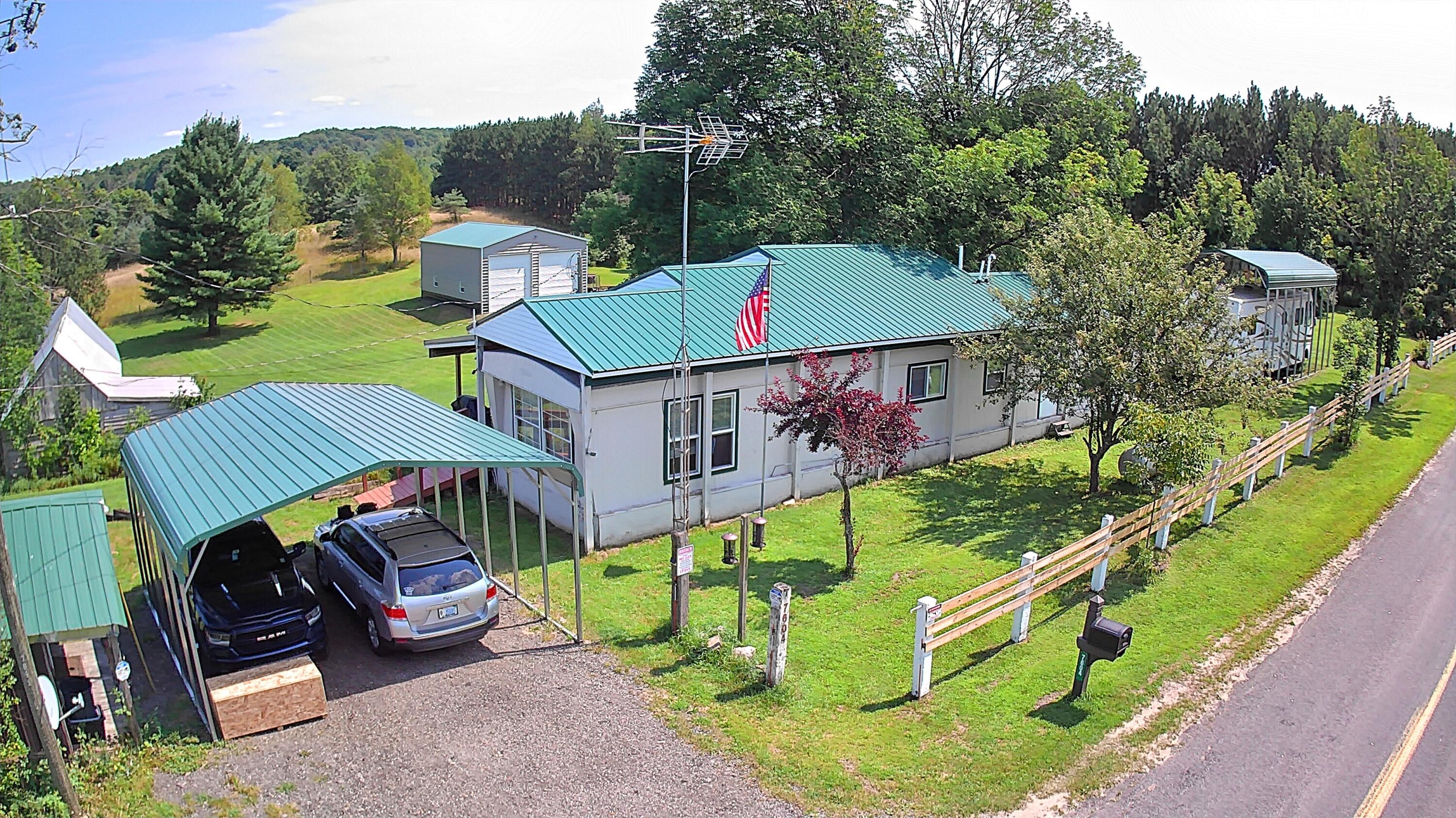 7604 South Saddler Road Chase, MI 49623 - Photo 1 of 43 20240808-142055-063698-0