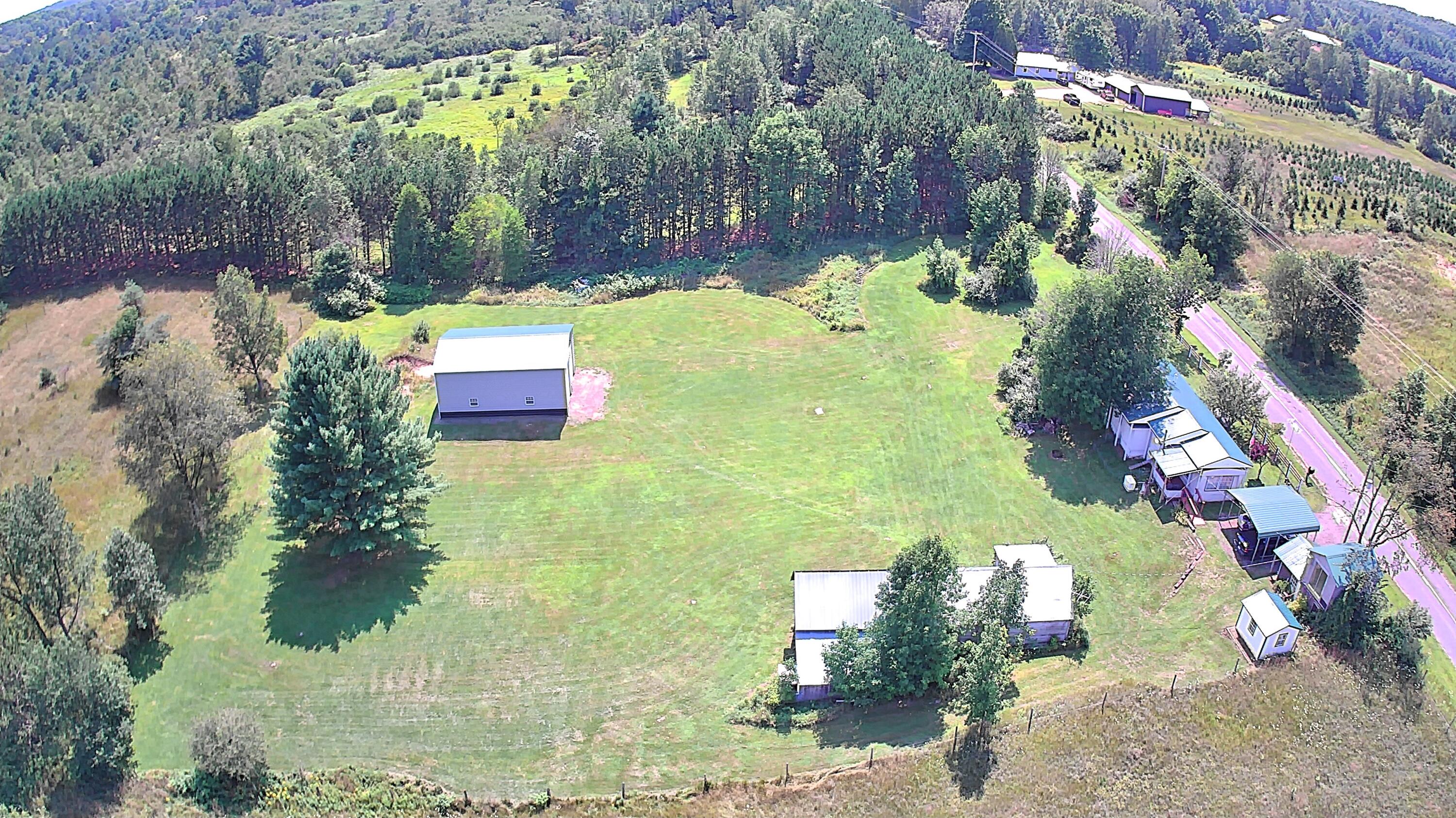 7604 South Saddler Road Chase, MI 49623 - Photo 2 of 43 Front