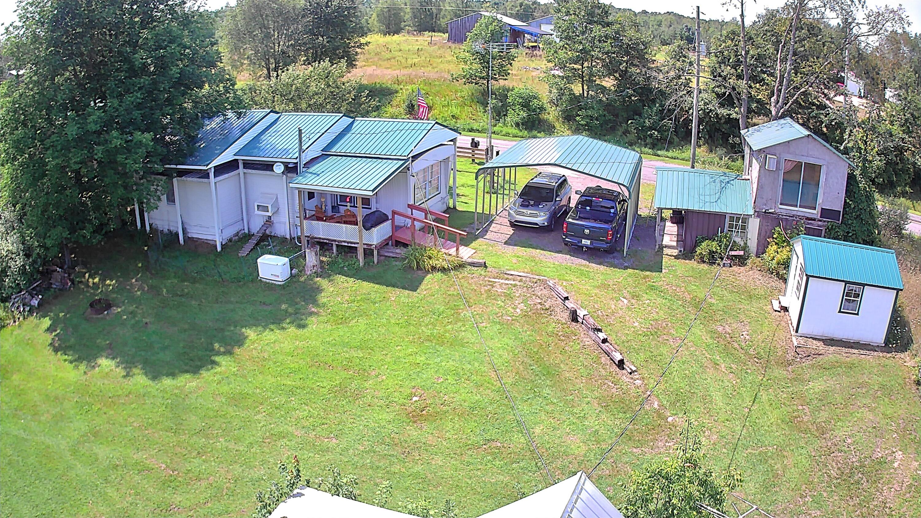 7604 South Saddler Road Chase, MI 49623 - Photo 3 of 43 20240808-141732-253119-0