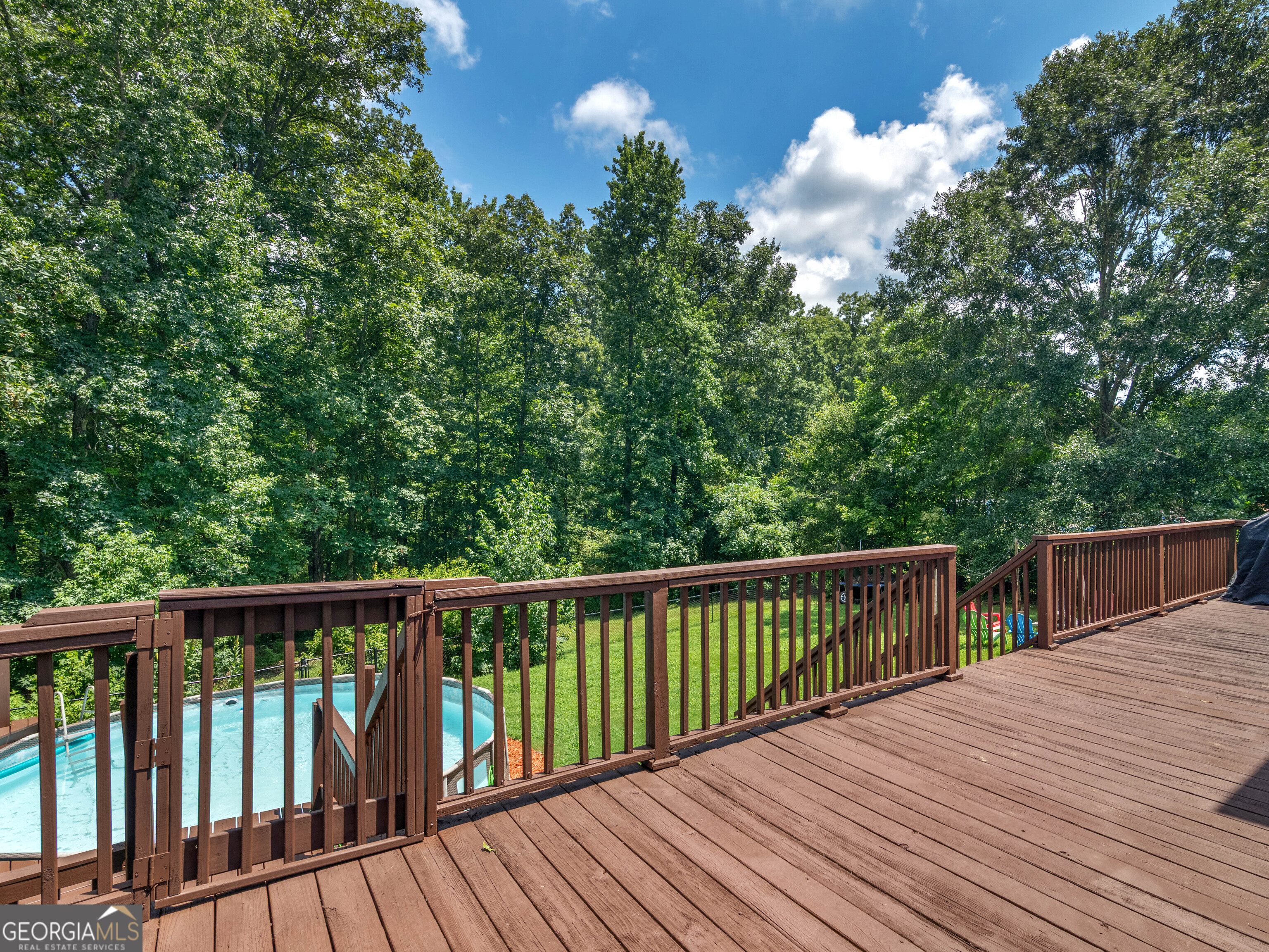 545 Barhams Ridge Drive McDonough, GA 30252 - Photo 3 of 55 a balcony with wooden floor