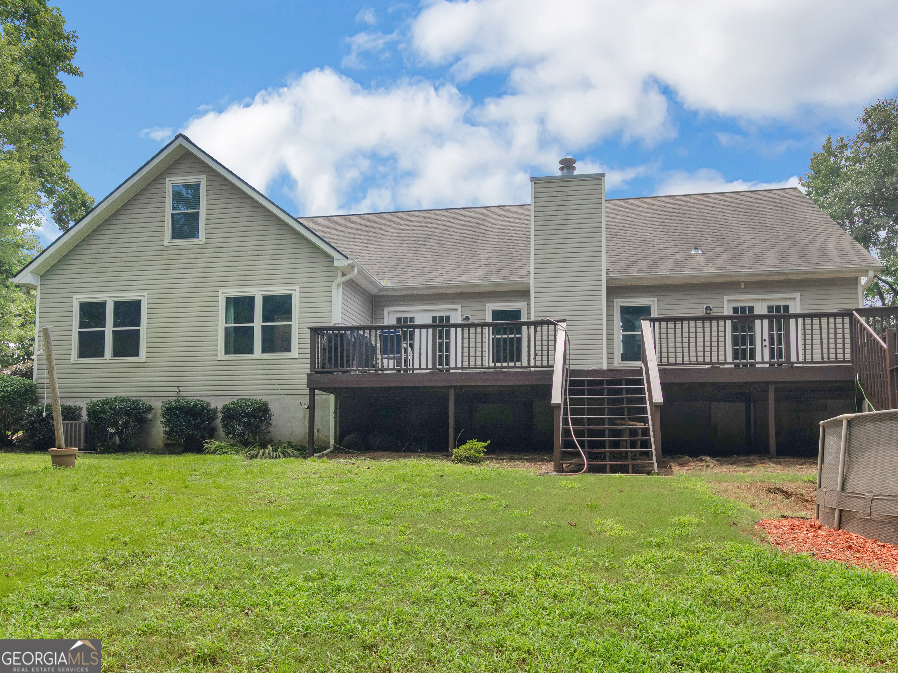 545 Barhams Ridge Drive McDonough, GA 30252 - Photo 51 of 55 a house view with a garden space