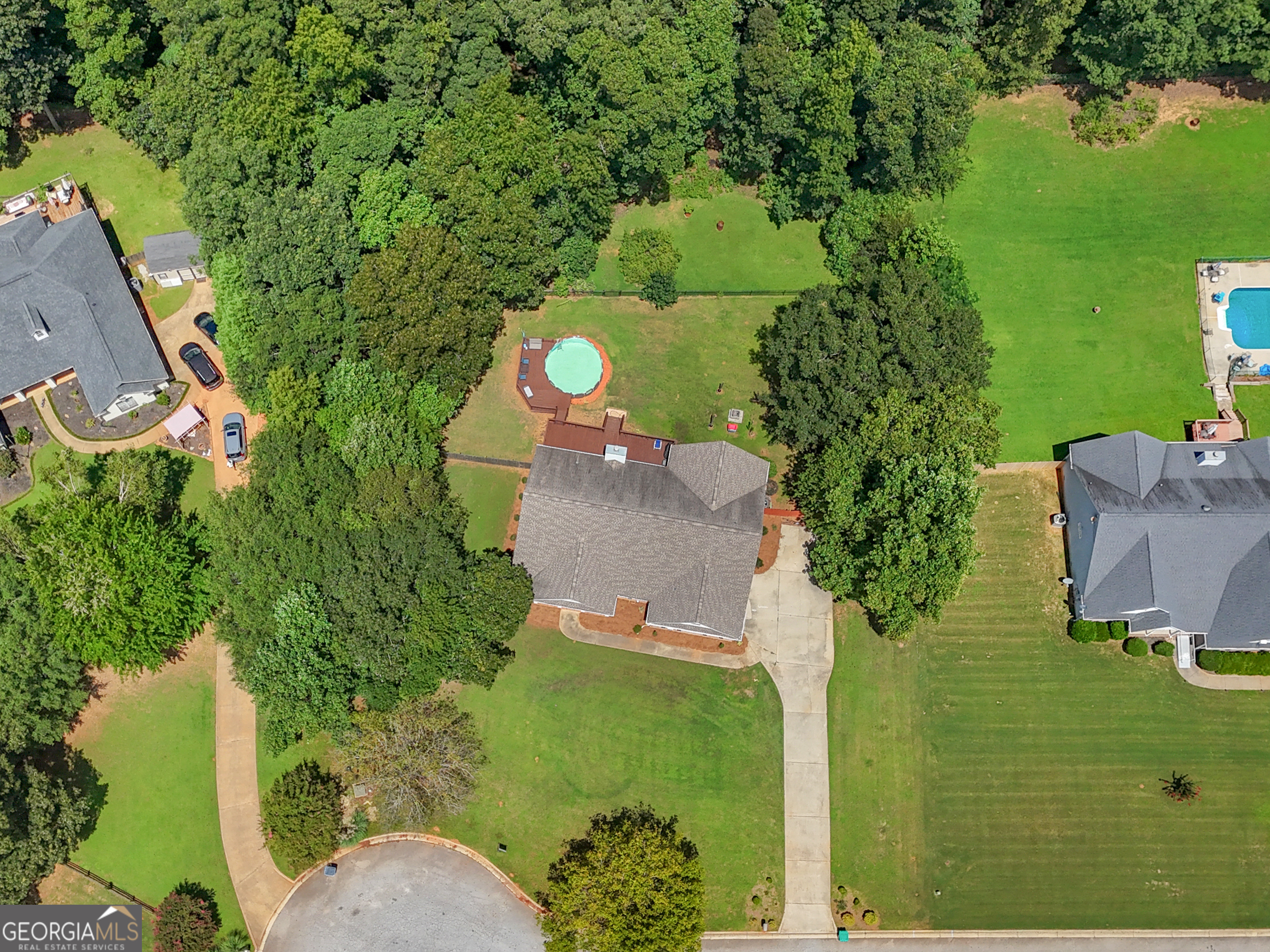 545 Barhams Ridge Drive McDonough, GA 30252 - Photo 53 of 55 aerial view of a house with a yard
